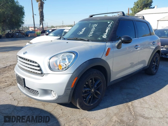 2013 MINI Countryman with VIN WMWZB3C59DWM09740, listed as a IAAI auction lot 41648192 with 145,915 mi miles and . Bid and sale history available at DreamBid. Image 2.