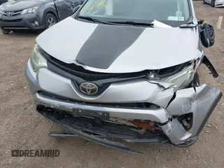 2018 Toyota RAV4 XLE with VIN 2T3RFREV1JW718474, listed as a IAAI auction lot 42144572 with 62,852 mi miles and . Bid and sale history available at DreamBid. Image 6.