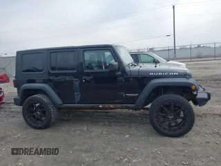 2008 Jeep Wrangler Rubicon with VIN 1J8GA69128L547347, listed as a IAAI auction lot 41985787 with 151,461 mi miles and . Bid and sale history available at DreamBid. Image 13.