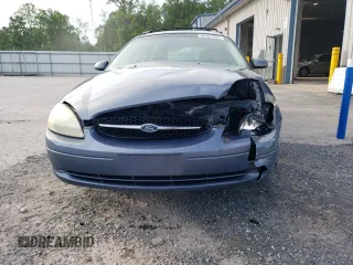 2001 Ford Taurus SE Standard with VIN 1FAHP58S71G184725, listed as a Copart auction lot 56401895 with 163,238 mi miles and Salvage title. Bid and sale history available at DreamBid. Image 5.