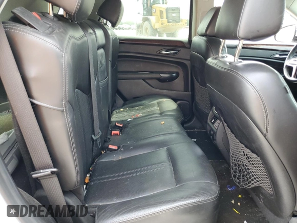 2014 Cadillac SRX Premium Collection z VIN 3GYFNDE37ES652548, wystawiony jako Copart lot #65895833 z przebiegiem 151 653 mil mil oraz Szkoda całkowita • Salvage title. Historia ofert i sprzedaży dostępna na DreamBid. Obrazek 10.