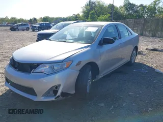 2012 Toyota Camry L with VIN 4T4BF1FK7CR247407, listed as a IAAI auction lot 42123976 with 99,809 mi miles. Bid and sale history available at carsss.com. Image 2.