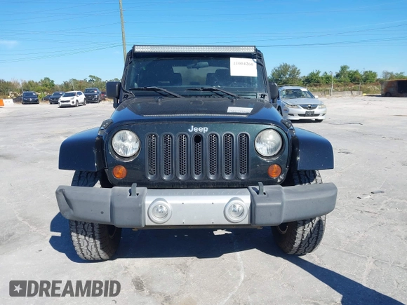 2012 Jeep Wrangler Arctic with VIN 1C4AJWBG7CL170079, listed as a IAAI auction lot 41004260 with 83,408 mi miles and . Bid and sale history available at DreamBid. Image 12.