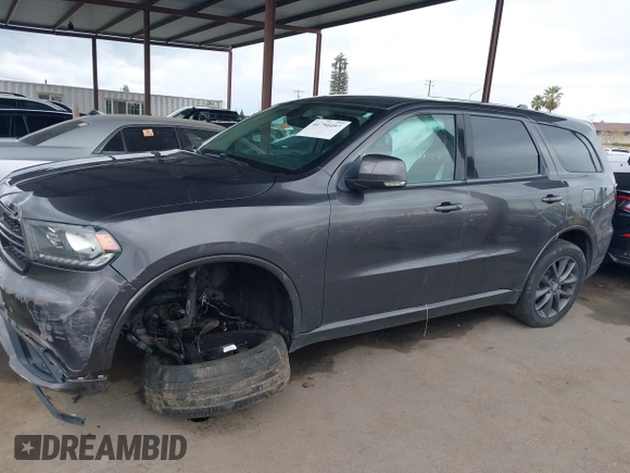 2017 Dodge Durango GT with VIN 1C4RDJDG3HC936794, listed as a IAAI auction lot 41794497 with 131,635 mi miles and . Bid and sale history available at carsss.com. Image 14.