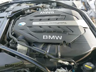 2015 BMW 6 Series 650i xDrive z VIN WBA6B4C5XFD761569, wystawiony jako IAAI lot #42646861 z przebiegiem 55 306 mil mil oraz . Historia ofert i sprzedaży dostępna na DreamBid. Obrazek 22.