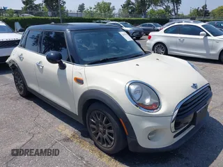 2018 MINI Hardtop 4 Door Cooper with VIN WMWXU1C54J2F79919, listed as a IAAI auction lot 42470834 with 93,338 mi miles and . Bid and sale history available at DreamBid. Image 1.