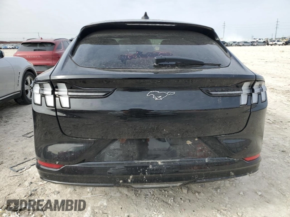 2024 Ford Mustang Mach-E Premium z VIN 3FMTK3R78RMA23282, wystawiony jako Copart lot #88931835 z przebiegiem Nie podano mil oraz Szkoda całkowita • Salvage title. Historia ofert i sprzedaży dostępna na DreamBid. Obrazek 6.