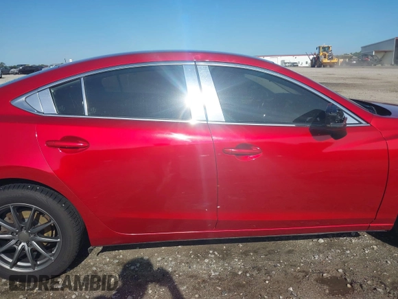 2017 Mazda 6 Sport z VIN JM1GL1U52H1125024, wystawiony jako IAAI lot #42115413 z przebiegiem 191 727 mil mil oraz . Historia ofert i sprzedaży dostępna na DreamBid. Obrazek 14.