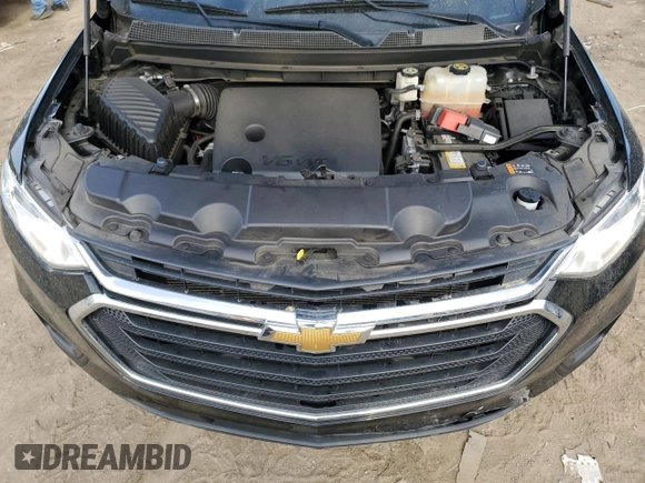 2020 Chevrolet Traverse LS z VIN 1GNERFKW7LJ313830, wystawiony jako Copart lot #51743465 z przebiegiem 56 874 mil mil oraz Szkoda całkowita • Salvage title. Historia ofert i sprzedaży dostępna na DreamBid. Obrazek 12.
