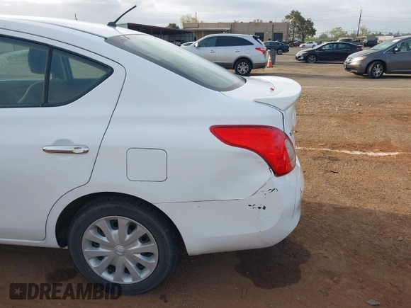 2014 Nissan Versa S Plus with VIN 3N1CN7AP1EL843379, listed as a IAAI auction lot 41905567 with 125,293 mi miles. Bid and sale history available at carsss.com. Image 6.