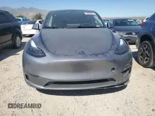 2024 Tesla Model Y Long Range with VIN 7SAYGDEE6RA321064, listed as a Copart auction lot 58889795 with 48,857 mi miles and Salvage title. Bid and sale history available at DreamBid. Image 5.