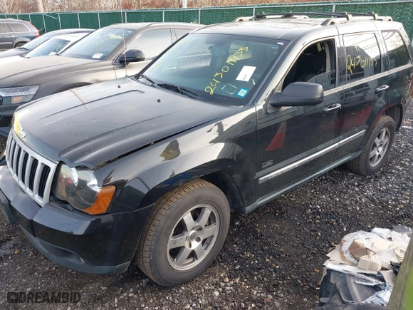 2009 Jeep Grand Cherokee Laredo with VIN 1J8GR48K29C552248, listed as a IAAI auction lot 41209184 with 194,778 mi miles. Bid and sale history available at carsss.com. Image 2.