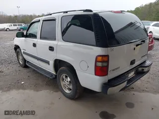 2003 Chevrolet Tahoe LT with VIN 1GNEC13Z63J126611, listed as a IAAI auction lot 41300437 with 313,885 mi miles. Bid and sale history available at carsss.com. Image 3.