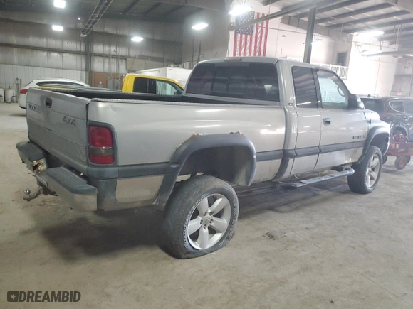 2000 Dodge Ram 1500 with VIN 3B7HF13ZXYG162341, listed as a Copart auction lot 74234234 with 0 mi miles and Salvage Title. Bid and sale history available at carsss.com. Image 3.