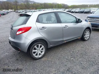 2011 Mazda Mazda2 Sport with VIN JM1DE1HZXB0112402, listed as a IAAI auction lot 41954565 with 153,351 mi miles. Bid and sale history available at carsss.com. Image 4.
