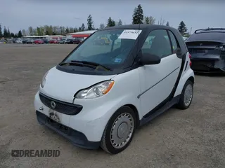 2014 Smart fortwo Pure with VIN WMEEJ3BA8EK747384, listed as a IAAI auction lot 41979651 with 29,586 mi miles and . Bid and sale history available at DreamBid. Image 2.