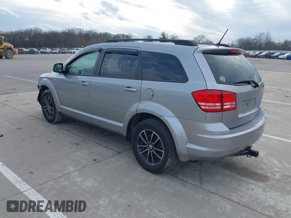 2018 Dodge Journey SE with VIN 3C4PDCABXJT295391, listed as a IAAI auction lot 41707149 with 134,221 mi miles. Bid and sale history available at carsss.com. Image 3.
