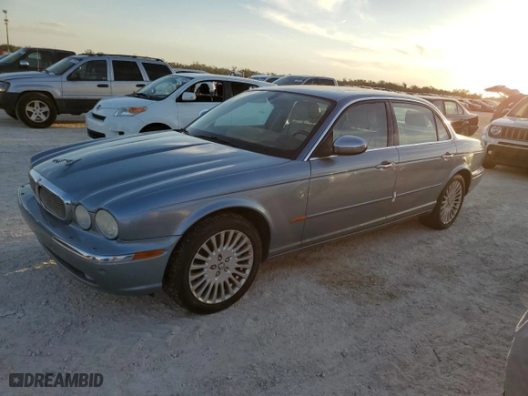 2005 Jaguar XJ VDP with VIN SAJWA82C65SG45247, listed as a Copart auction lot 77950594 with NaN miles and Salvage Title. Bid and sale history available at carsss.com. Image 1.