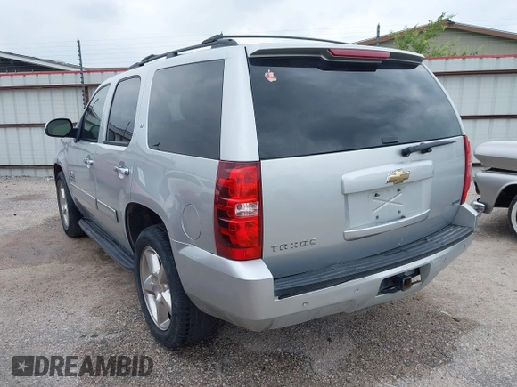 2011 Chevrolet Tahoe LT with VIN 1GNSCBE05BR190310, listed as a IAAI auction lot 42243623 with 249,453 mi miles and . Bid and sale history available at DreamBid. Image 3.