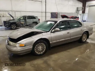 1995 Chrysler LHS z VIN 2C3HC56F5SH597622, wystawiony jako Copart lot #81573174 z przebiegiem 101 884 mil mil oraz Szkody całkowita. Historia ofert i sprzedaży dostępna na DreamBid. Obrazek 1.