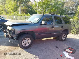 2001 Chevrolet Tahoe LS with VIN 1GNEC13T11R182692, listed as a IAAI auction lot 41511354 with 293,614 mi miles and . Bid and sale history available at DreamBid. Image 14.