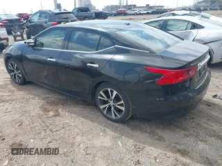 2016 Nissan Maxima Platinum with VIN 1N4AA6AP9GC391227, listed as a IAAI auction lot 42013542 with 169,016 mi miles and . Bid and sale history available at DreamBid. Image 3.