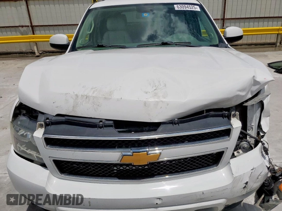 2014 Chevrolet Tahoe LT with VIN 1GNSCBE07ER239575, listed as a Copart auction lot 63094525 with 142,467 mi miles and Salvage title. Bid and sale history available at DreamBid. Image 12.