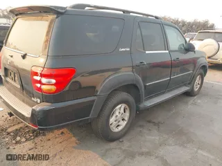2002 Toyota Sequoia Limited with VIN 5TDZT38A32S065230, listed as a IAAI auction lot 41290794 with 306,444 mi miles. Bid and sale history available at carsss.com. Image 4.