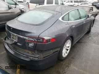 2018 Tesla Model S 75D with VIN 5YJSA1E24JF245215, listed as a Copart auction lot 63788121 with Not provided miles and Salvage title. Bid and sale history available at DreamBid. Image 4.