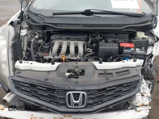 2012 Honda Fit Sport with VIN JHMGE8H52CC018984, listed as a IAAI auction lot 40880358 with 111,614 mi miles. Bid and sale history available at carsss.com. Image 10.