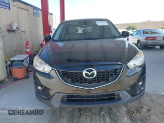 2015 Mazda CX-5 Grand Touring with VIN JM3KE4DY7F0481883, listed as a IAAI auction lot 42091709 with 184,248 mi miles and . Bid and sale history available at DreamBid. Image 13.