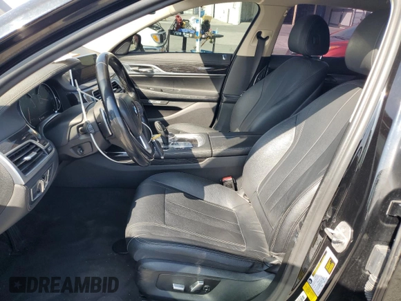 2017 BMW 7 Series 740i with VIN WBA7E2C50HG739565, listed as a Copart auction lot 64584885 with 114,496 mi miles and Salvage title. Bid and sale history available at DreamBid. Image 7.