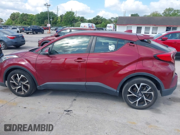 2019 Toyota C-HR XLE with VIN JTNKHMBX0K1017215, listed as a IAAI auction lot 41898189 with 74,239 mi miles. Bid and sale history available at carsss.com. Image 14.