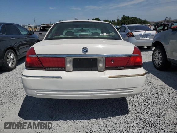 2000 Mercury Grand Marquis LS z VIN 2MEFM75W3YX689886, wystawiony jako Copart lot #54128735 z przebiegiem 54 819 mil mil oraz Szkoda całkowita • Salvage title. Historia ofert i sprzedaży dostępna na DreamBid. Obrazek 6.