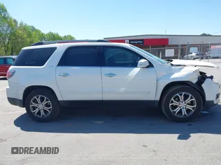 2014 GMC Acadia SLT z VIN 1GKKRRKD4EJ374149, wystawiony jako IAAI lot #41998400 z przebiegiem 193 462 mil mil oraz . Historia ofert i sprzedaży dostępna na DreamBid. Obrazek 14.