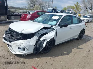 2023 Honda Civic Sport with VIN 19XFL2H80PE010813, listed as a IAAI auction lot 41999917 with 20,734 mi miles and . Bid and sale history available at DreamBid. Image 2.