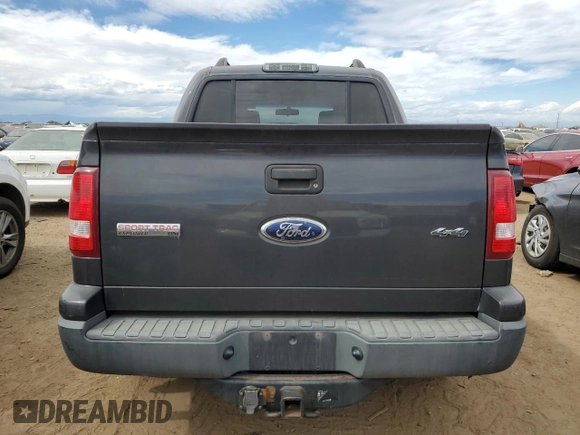 2007 Ford Explorer Sport Trac XLT with VIN 1FMEU51827UA46746, listed as a Copart auction lot 70930394 with 237,477 mi miles and Salvage title. Bid and sale history available at DreamBid. Image 6.