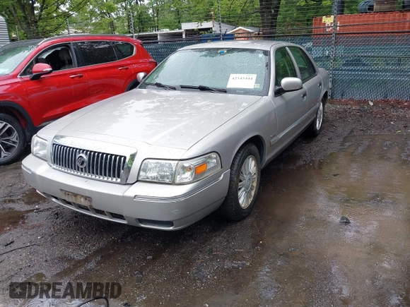 2010 Mercury Grand Marquis LS z VIN 2MEBM7FV5AX606629, wystawiony jako IAAI lot #42345444 z przebiegiem 66 600 mil mil oraz . Historia ofert i sprzedaży dostępna na DreamBid. Obrazek 2.
