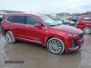 2022 Cadillac XT6 Premium Luxury with VIN 1GYKPDRS6NZ118860, listed as a IAAI auction lot 41459341 with 64,682 mi miles. Bid and sale history available at carsss.com. Image 1.