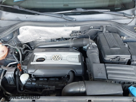 2012 Volkswagen Tiguan SEL with VIN WVGAV7AX1CW004744, listed as a IAAI auction lot 41924952 with 100,964 mi miles and . Bid and sale history available at DreamBid. Image 10.