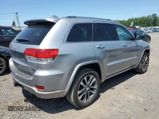 2018 Jeep Grand Cherokee Overland with VIN 1C4RJFCG2JC212947, listed as a Copart auction lot 59503405 with 76,436 mi miles and Clean title. Bid and sale history available at DreamBid. Image 3.