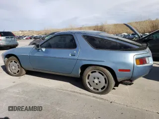 1985 Porsche 928 z VIN WP0JB092XFS860634, wystawiony jako Copart lot #49650775 z przebiegiem 140 644 mil mil oraz Tytuł czysty. Historia ofert i sprzedaży dostępna na DreamBid. Obrazek 2.