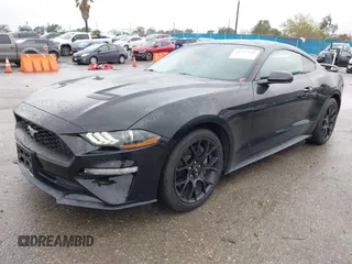 2018 Ford Mustang EcoBoost z VIN 1FA6P8TH3J5129088, wystawiony jako IAAI lot #41792548 z przebiegiem 55 991 mil mil oraz . Historia ofert i sprzedaży dostępna na DreamBid. Obrazek 17.