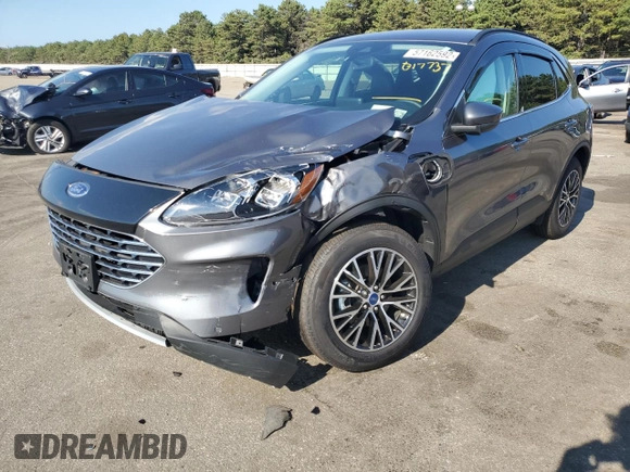2021 Ford Escape Titanium Plug-In Hybrid z VIN 1FMCU0LZ1MUB17737, wystawiony jako Copart lot #57162592 z przebiegiem Nie podano mil oraz . Historia ofert i sprzedaży dostępna na DreamBid. Obrazek 2.