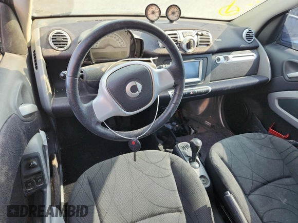 2013 Smart fortwo Passion with VIN WMEEJ9AA2DK722421, listed as a Copart auction lot 65154035 with 19,579 mi miles and Clean title. Bid and sale history available at DreamBid. Image 8.