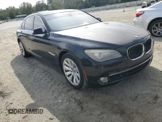 2011 BMW 7 Series with VIN WBAKX8C52BC198377, listed as a Copart auction lot 70003444 with 173,725 mi miles and Salvage title. Bid and sale history available at DreamBid. Image 4.