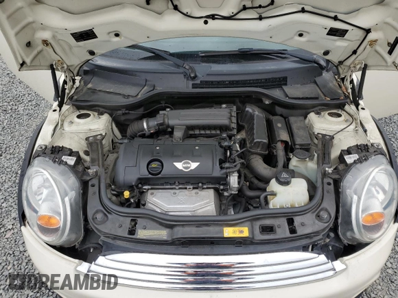 2013 MINI Hardtop with VIN WMWSU3C55DT546249, listed as a Copart auction lot 56799675 with 140,825 mi miles and Clean Title. Bid and sale history available at DreamBid. Image 12.