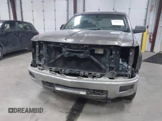 2014 Chevrolet Silverado 1500 LT with VIN 1GCVKREC9EZ240612, listed as a IAAI auction lot 41108566 with 200,625 mi miles and . Bid and sale history available at DreamBid. Image 13.