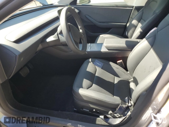 2025 Tesla Model 3 Long Range with VIN 5YJ3E1EA7SF994768, listed as a Copart auction lot 57649615 with 611 mi miles and Salvage title. Bid and sale history available at DreamBid. Image 7.
