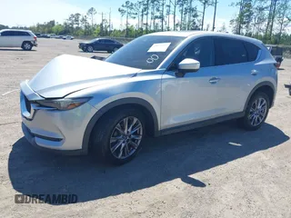 2019 Mazda CX-5 Grand Touring with VIN JM3KFADM1K1606082, listed as a IAAI auction lot 41875878 with 66,089 mi miles. Bid and sale history available at carsss.com. Image 17.